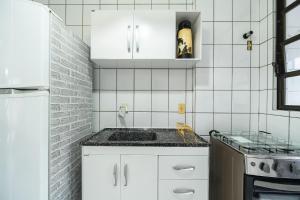 Apto Luar 2Q 10 metros da praia by Achei Floripa