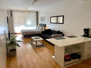 Apartamento Céntrico y Moderno con Balcon, Piscina, Gimnasio y Laundry