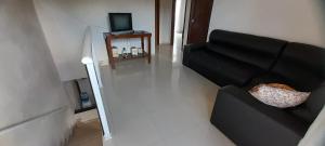 Sobrado com piscina ItapoĆ”