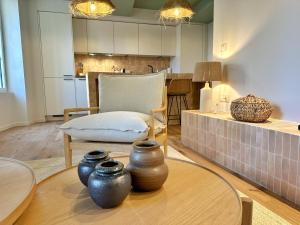 La Maison Cavet 5 Appartements de standing au coeur du village : photos des chambres