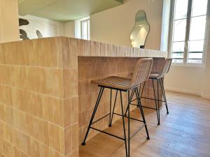 La Maison Cavet 5 Appartements de standing au coeur du village : photos des chambres