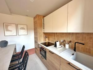 La Maison Cavet 5 Appartements de standing au coeur du village : photos des chambres