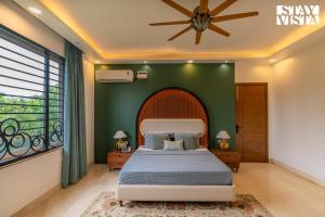 StayVista at Imperial Isle 4BHK Private Pool Villa in Sohna Delhi