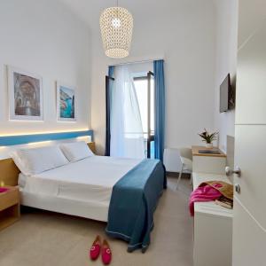 Double Room with Balcony and Lateral Sea View room in Hotel Miramare