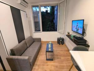 Au calme en ville, sans vis à vis et climatisé