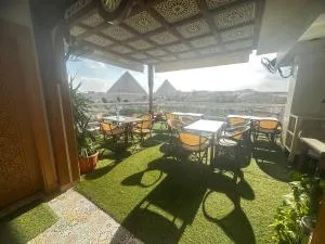 DouDou Pyramids View Hotel - Nazlat as Sammān