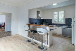 Maisons de vacances Le Ministere de la Paix - 15min to Gare du Nord : photos des chambres