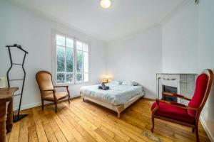 Maisons de vacances Le Ministere de la Paix - 15min to Gare du Nord : photos des chambres