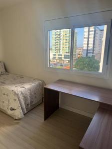 Belo apartamento com garagem a 250 mts da praia