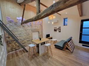 Appartements Le gite du Verger - Appartement a Arc et Senans : photos des chambres