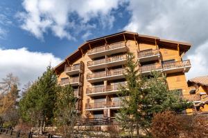Appartements La Joue du Loup, appartement pour 4 avec terrasse : photos des chambres