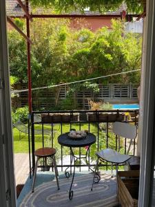 Appartements Un jardin en ville : photos des chambres