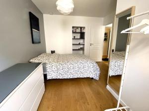 Appartements Un jardin en ville : photos des chambres