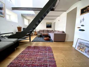 Appartements Un jardin en ville : photos des chambres