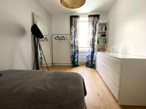Appartements Un jardin en ville : photos des chambres
