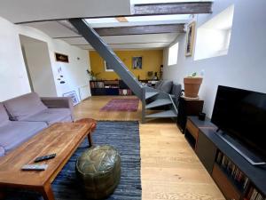 Appartements Un jardin en ville : photos des chambres