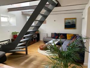 Appartements Un jardin en ville : photos des chambres
