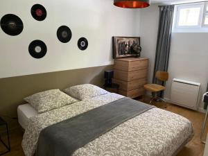 Appartements Un jardin en ville : photos des chambres