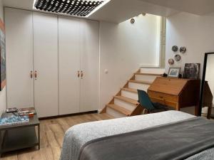 Appartements Un jardin en ville : photos des chambres