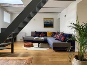 Appartements Un jardin en ville : photos des chambres