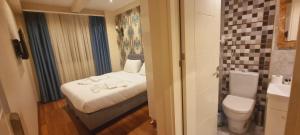 Economy Quadruple Room room in My Boutique Hotel