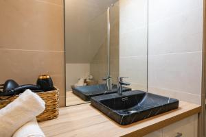 Appartements Elegance Contemporaine : photos des chambres