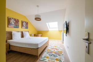 Appartements Elegance Contemporaine : photos des chambres