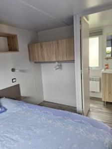 Campings Mobilhome 2 chambres climatise camping 3 etoiles : photos des chambres