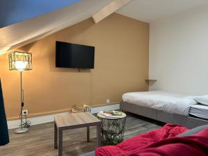 Appartements Le MONTLUSPOT : photos des chambres