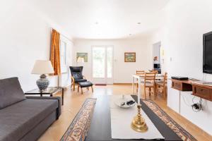 Appartements Petite maison avec terrasse - Soleil et Jardin : photos des chambres