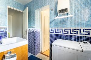 Appartements Petite maison avec terrasse - Soleil et Jardin : photos des chambres