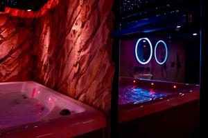 Appartements NUXIA Suites&SPA L-Avolupte : photos des chambres
