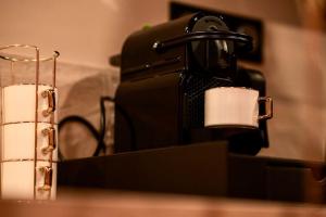 Appartements NUXIA Suites&SPA L-Avolupte : photos des chambres