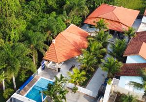 Casa com piscina aquecida, Condomínio a beira mar