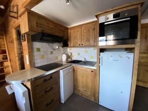 Résidence Scrischss - T2 de 6 couchages idéalement situé au cœur de la station, avec place de parking privée couverte MAE-5001