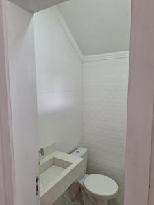 sobrado próximo a praia