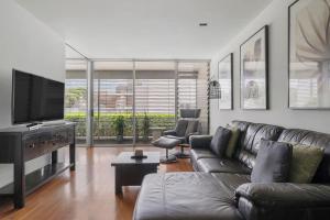 Urban Oasis with Parking Gym Sauna and Lap Pool