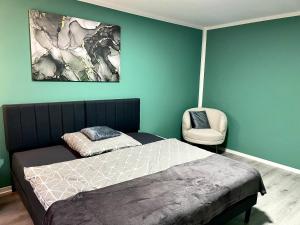 Appartement 3 - geräumige Wohnung mit eigener Küche, Bad und Gartenblick