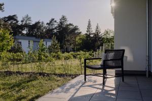 Apartment B 1 "Pine Hill Resort" Familienfreundlich mit eigenem Fahrradabteil & eingeschränktem Haffblick