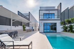 Elegant 4BR Villa with Assistant Room in Al Dana Island, Sharm, Fujairah by Deluxe Holiday Homes