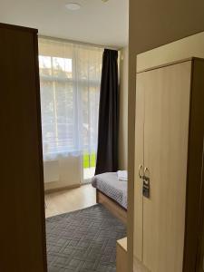 Palangos Dailė Self Check-in