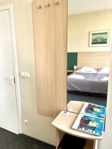 Palangos Dailė Self Check-in