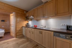 Appartements l-Ours Bleu B01 - Ski in Ski out - Happy Rentals : photos des chambres