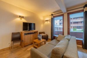 Appartements l-Ours Bleu B01 - Ski in Ski out - Happy Rentals : photos des chambres