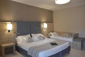Superior Triple Room room in Alma di Alghero Hotel