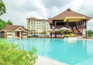 1BR Limketkai condo with WiFi, Netflix and Pool at One Oasis