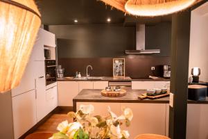 Appartements Le Duplex Gourmand - Clim et parking - WiFi : photos des chambres