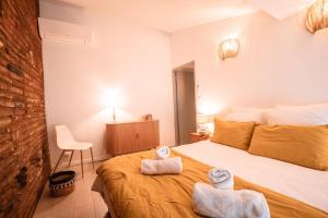 Appartements Le Duplex Gourmand - Clim et parking - WiFi : photos des chambres