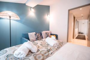Appartements Le Duplex Gourmand - Clim et parking - WiFi : photos des chambres