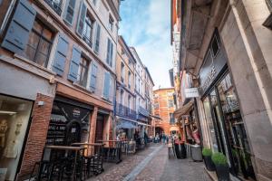 Appartements Le Duplex Gourmand - Clim et parking - WiFi : photos des chambres